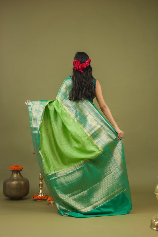 Pure Raw Mango Silk Banarasi Saree in Green & Teal with Silver Zari
