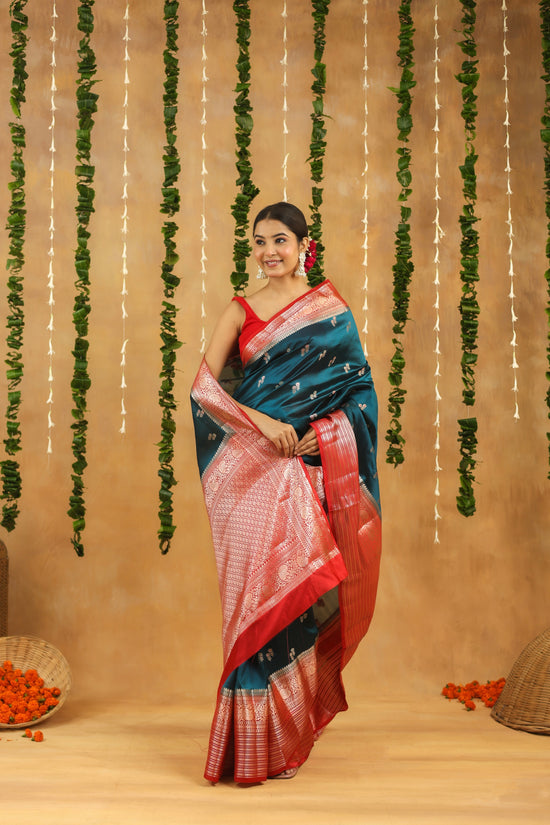 Handwoven royal teal Banarasi raw mango silk saree with crimson zari