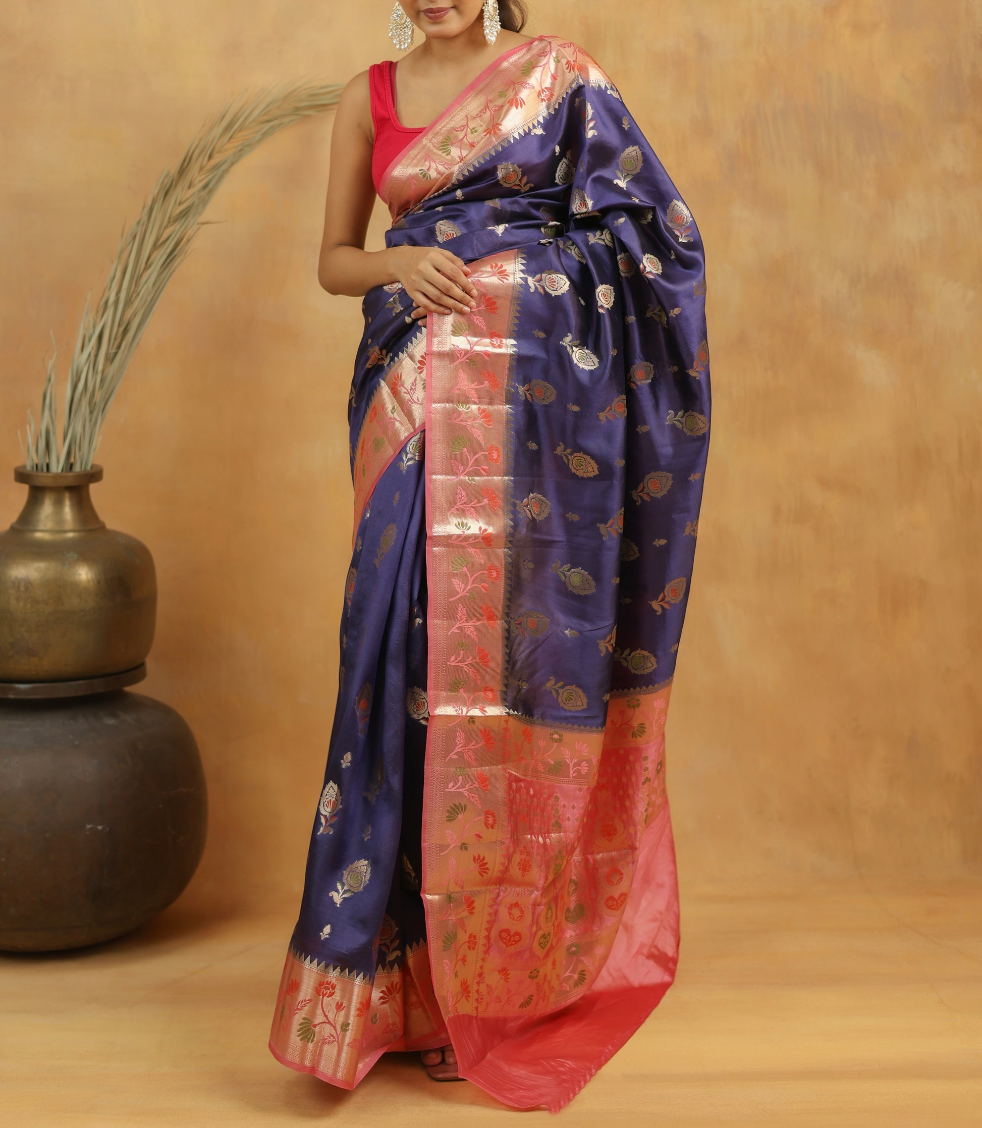 Navy Blue with Peach-Pink border Banarasi Dupion Silk
Saree with Zari & Floral Motifs