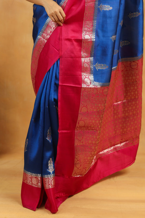 Royal Blue Banarasi Raw Silk Saree with Rani Pink Border and silver zari weaving
