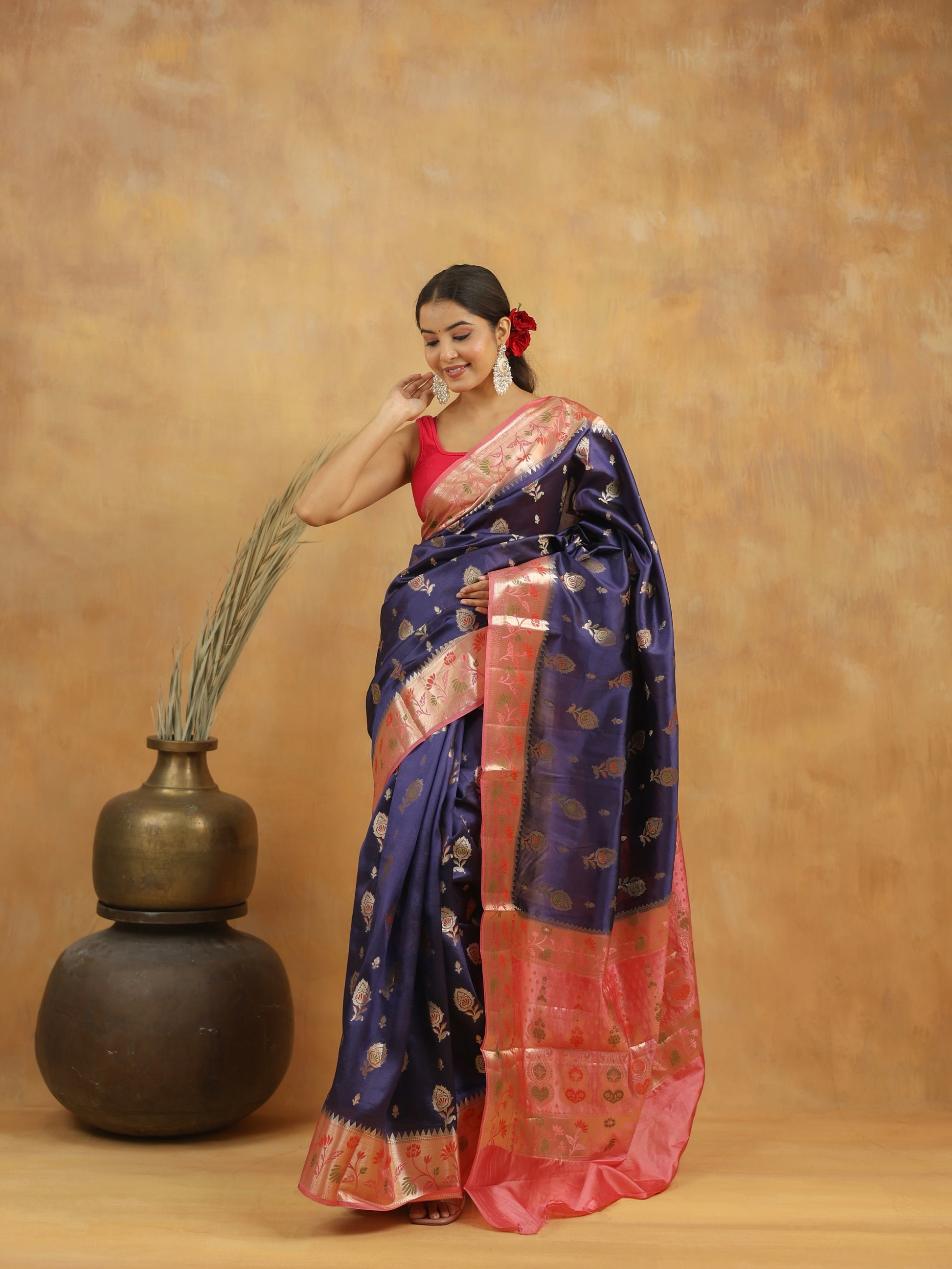 Navy Blue with Peach-Pink border Banarasi Dupion Silk
Saree with Zari & Floral Motifs