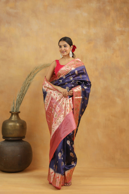 Navy Blue with Peach-Pink border Banarasi Dupion Silk
Saree with Zari & Floral Motifs