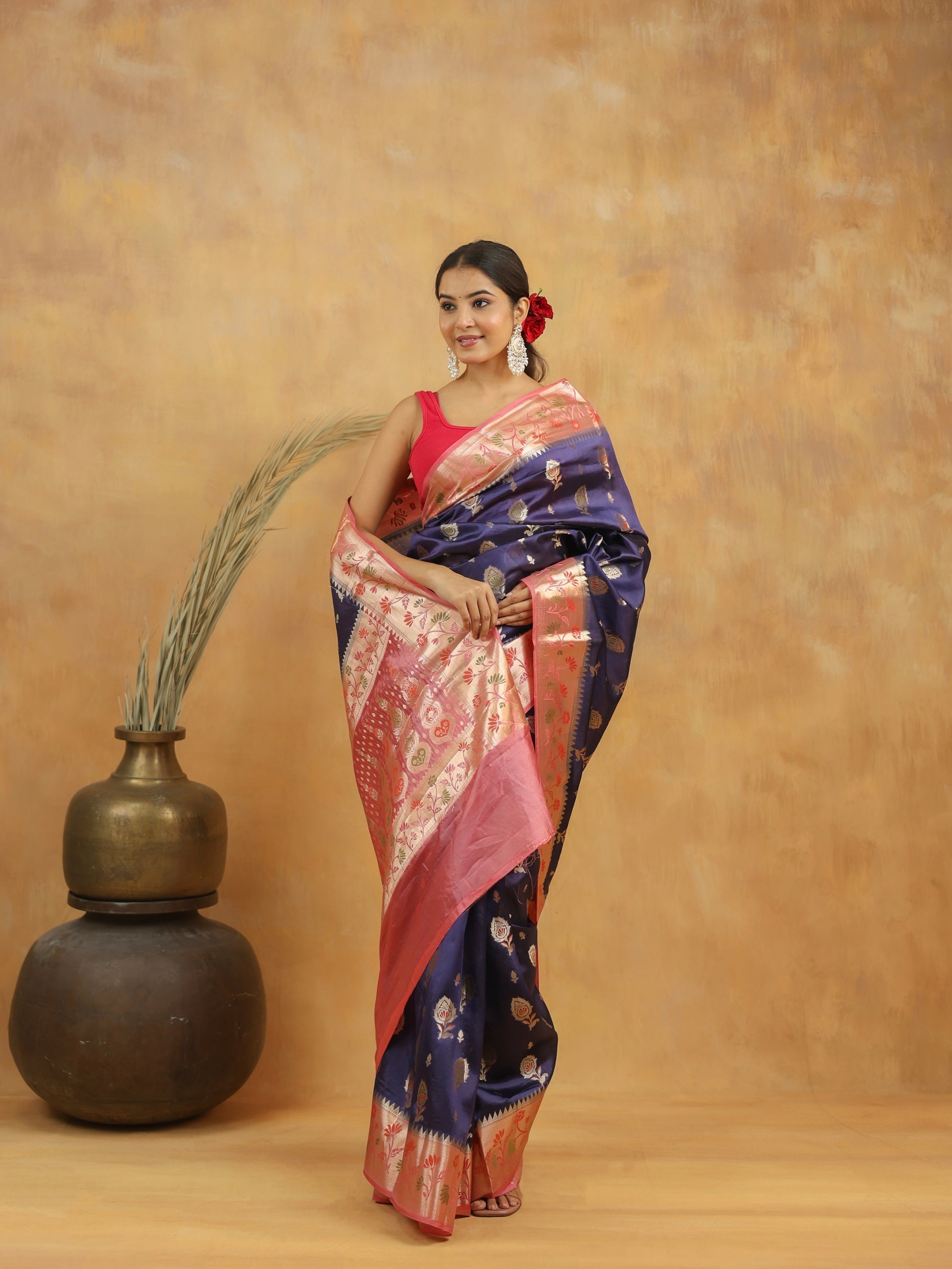 Navy Blue with Peach-Pink border Banarasi Dupion Silk
Saree with Zari & Floral Motifs