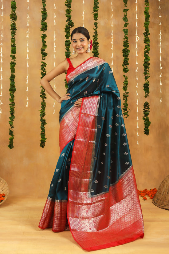 Handwoven royal teal Banarasi raw mango silk saree with crimson zari