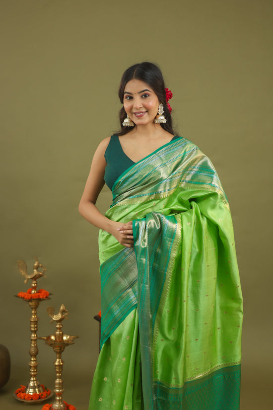 Pure Raw Mango Silk Banarasi Saree in Green & Teal with Silver Zari
