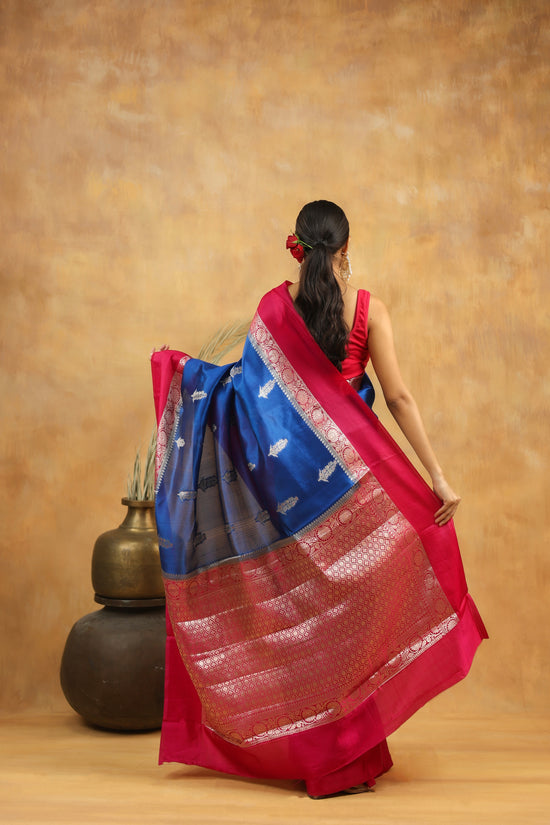 Royal Blue Banarasi Raw Silk Saree with Rani Pink Border and silver zari weaving