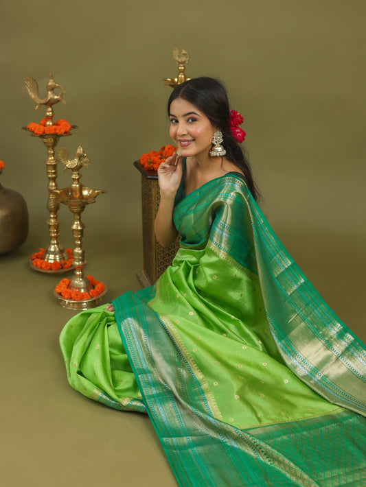 Pure Raw Mango Silk Banarasi Saree in Green & Teal with Silver Zari