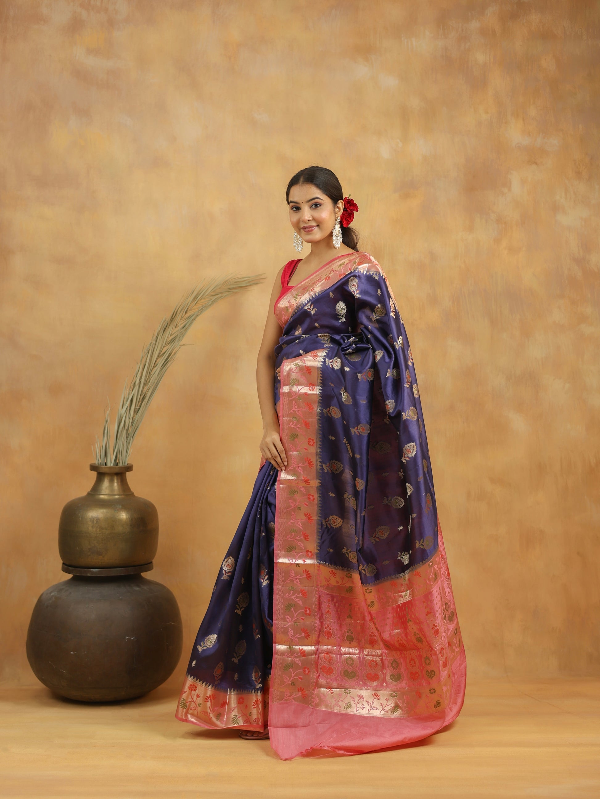 Navy Blue with Peach-Pink border Banarasi Dupion Silk
Saree with Zari & Floral Motifs