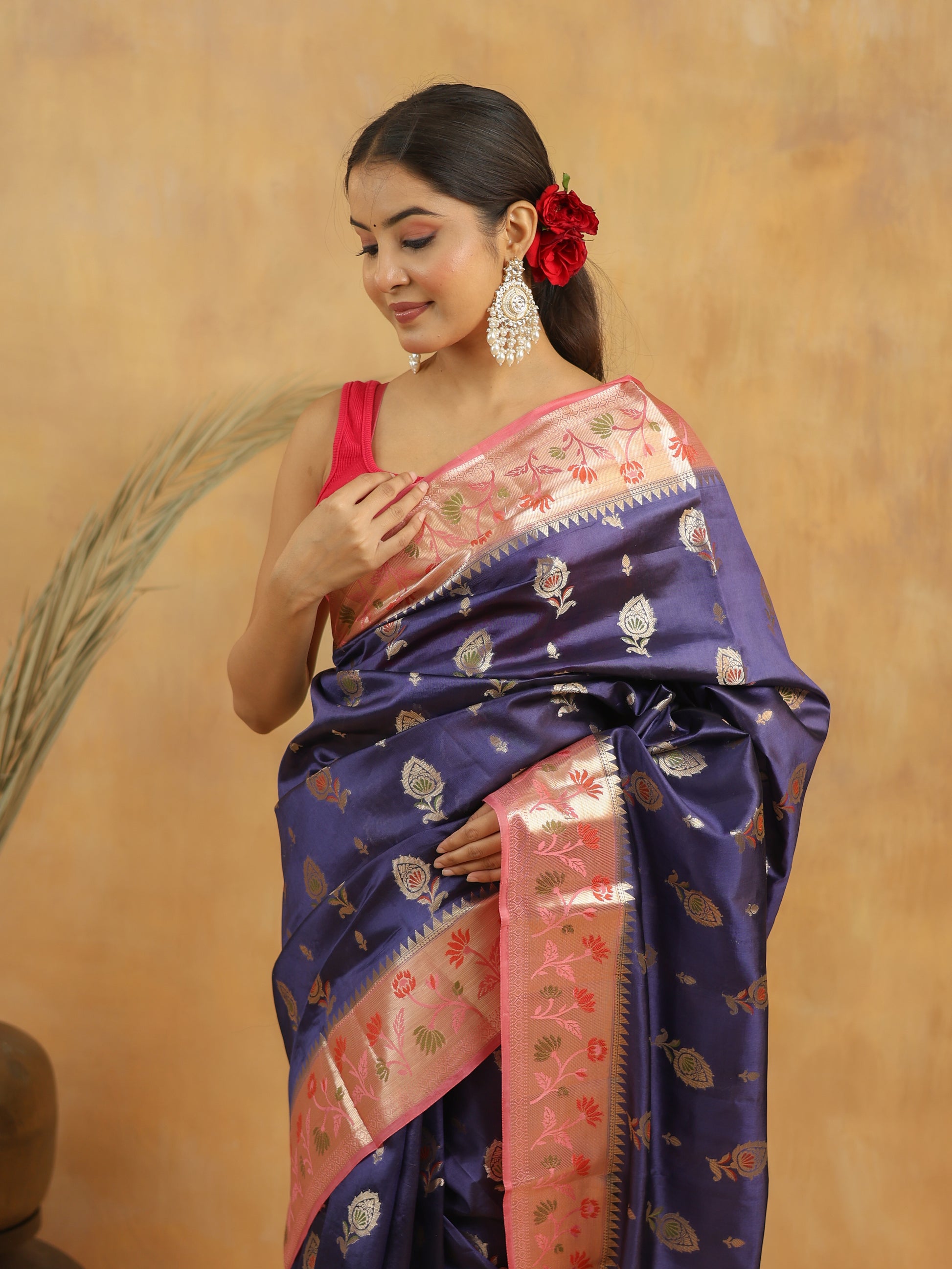 Navy Blue with Peach-Pink border Banarasi Dupion Silk
Saree with Zari & Floral Motifs