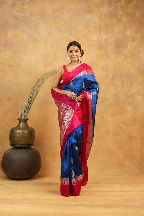 Royal Blue Banarasi Raw Silk Saree with Rani Pink Border and silver zari weaving