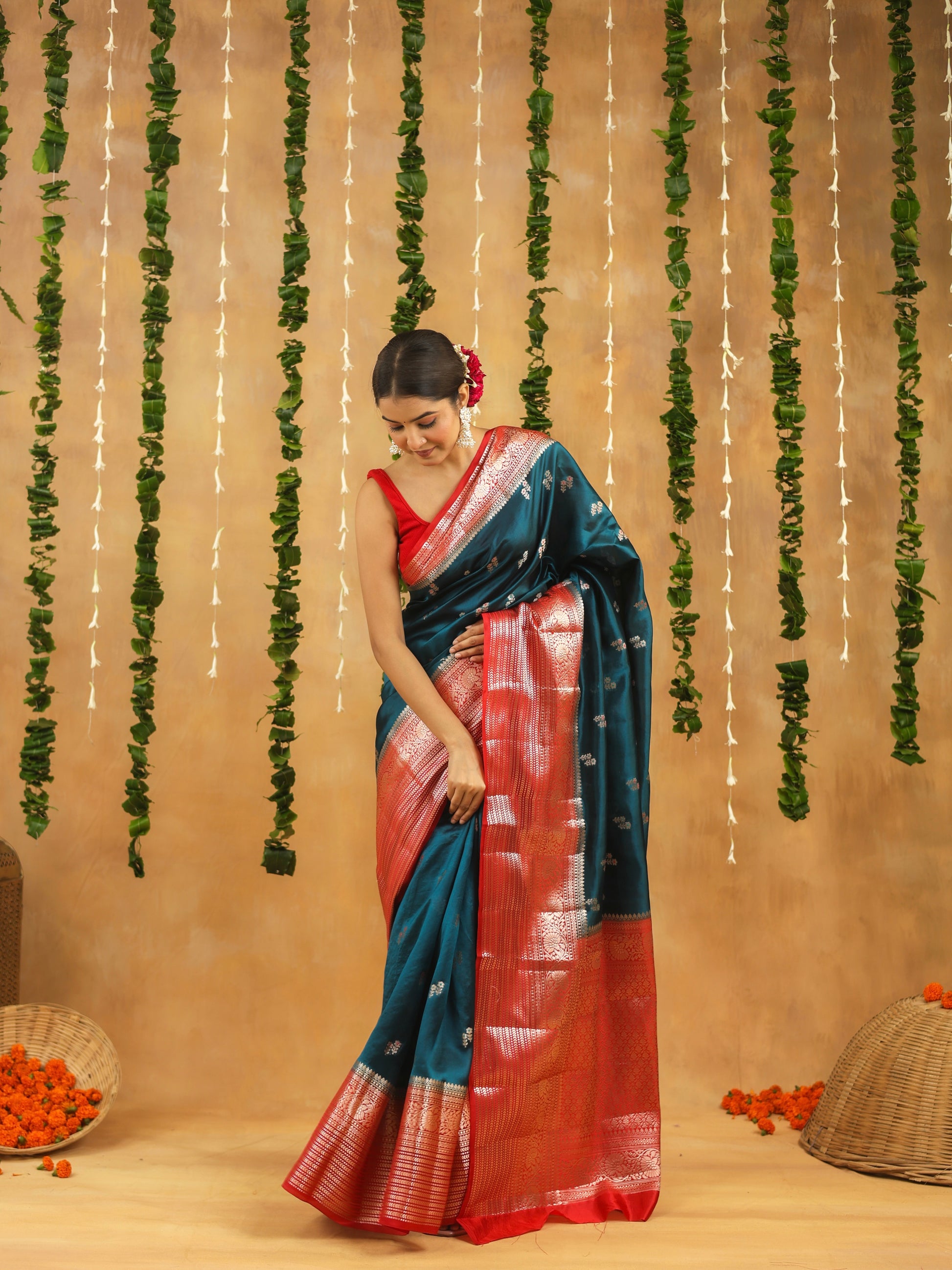 Handwoven royal teal Banarasi raw mango silk saree with crimson zari