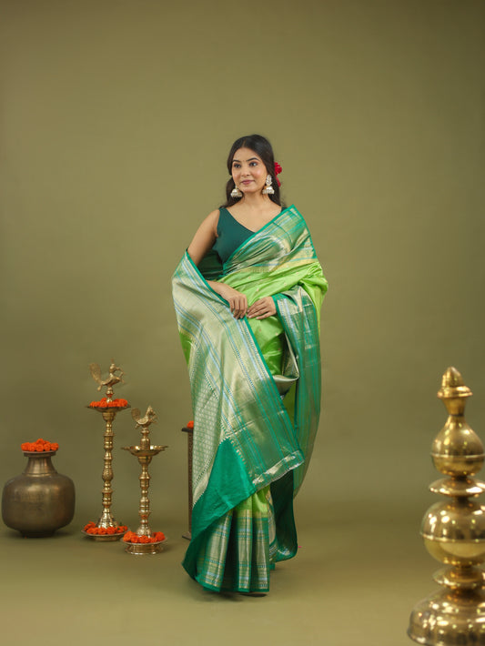 Pure Raw Mango Silk Banarasi Saree in Green & Teal with Silver Zari