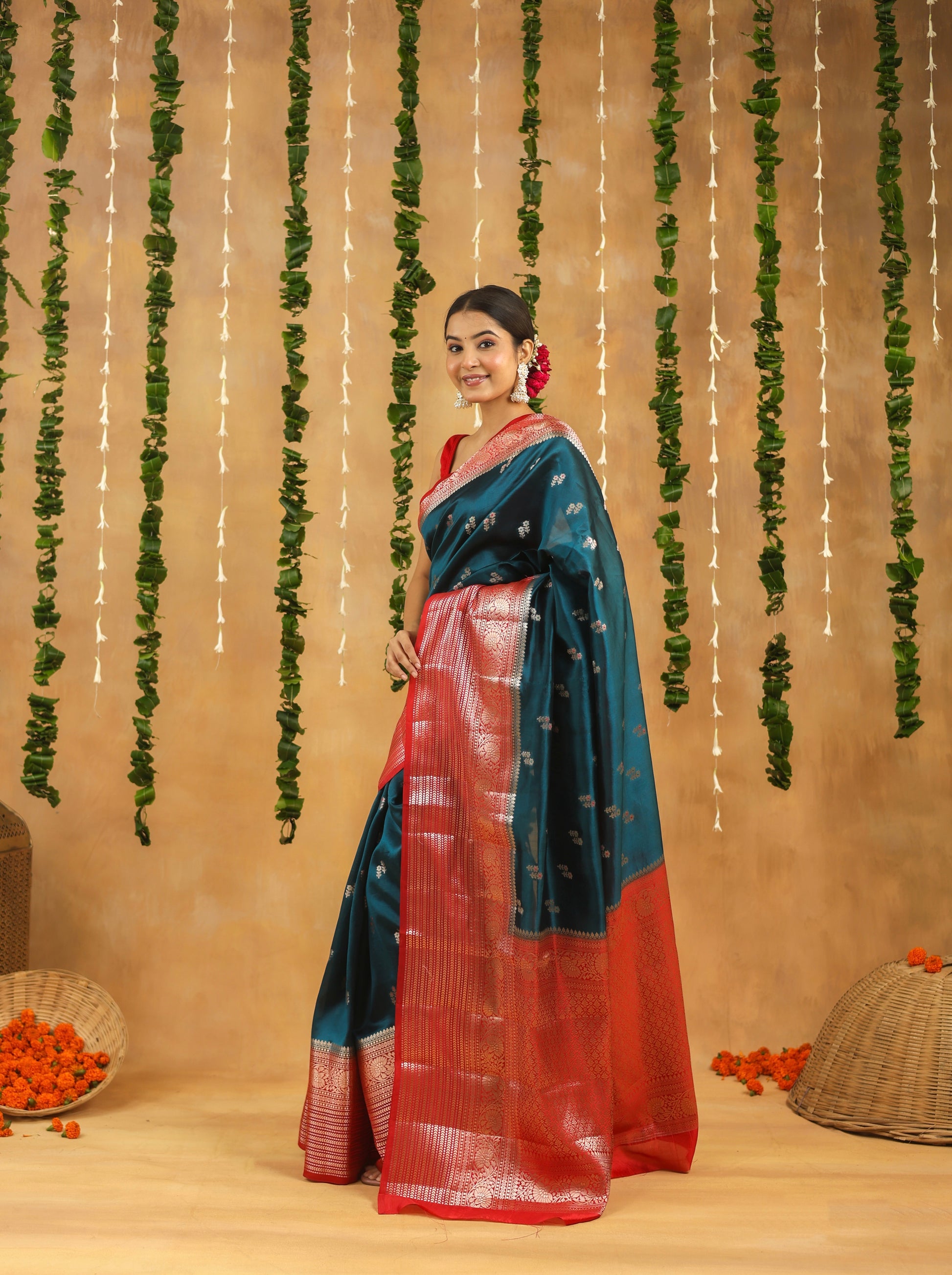 Handwoven royal teal Banarasi raw mango silk saree with crimson zari