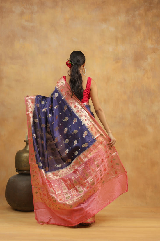 Navy Blue with Peach-Pink border Banarasi Dupion Silk
Saree with Zari & Floral Motifs